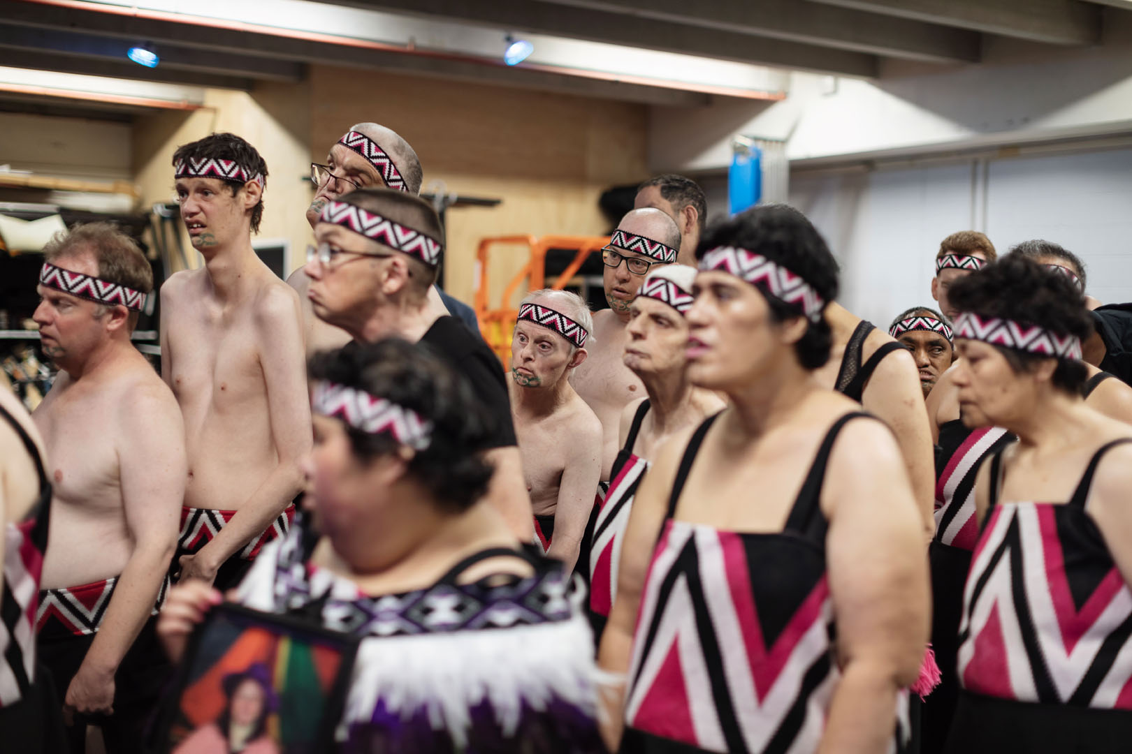 The rōpū members line up and anxiously wait in the wings of the stage. 