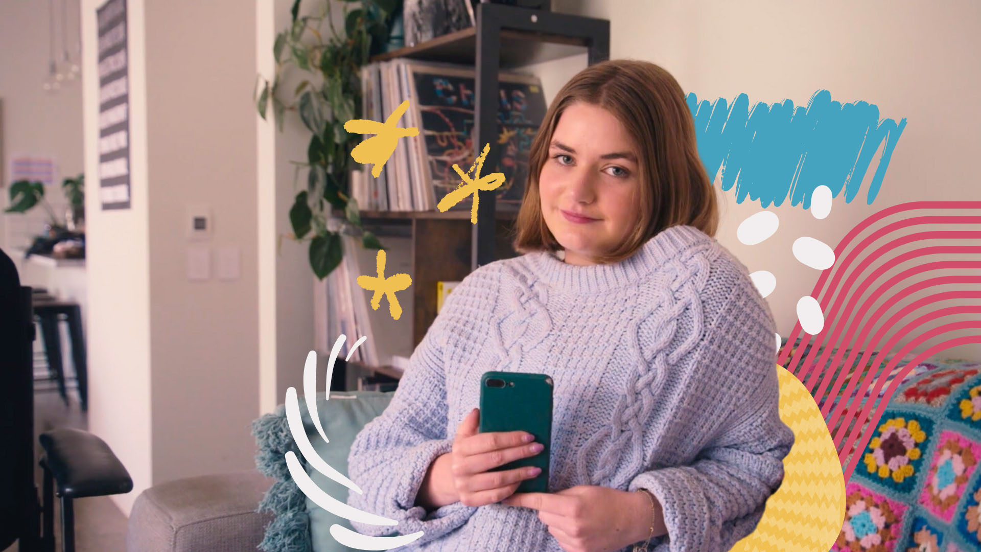 Alice Mander is holding a phone and wears a knitted jumper. She looks at the camera and there are colourful squiggles around her.