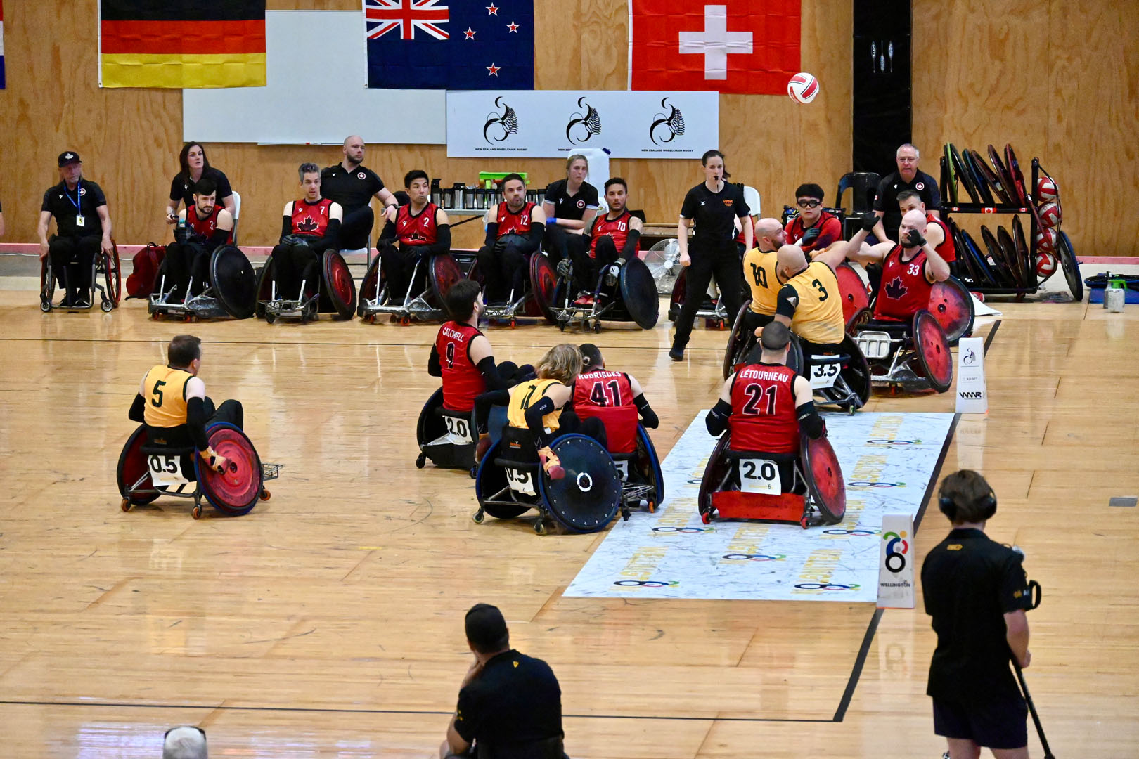 Athletes from Canada and Australia play in the final game of the wheelchair rugby tournament. 