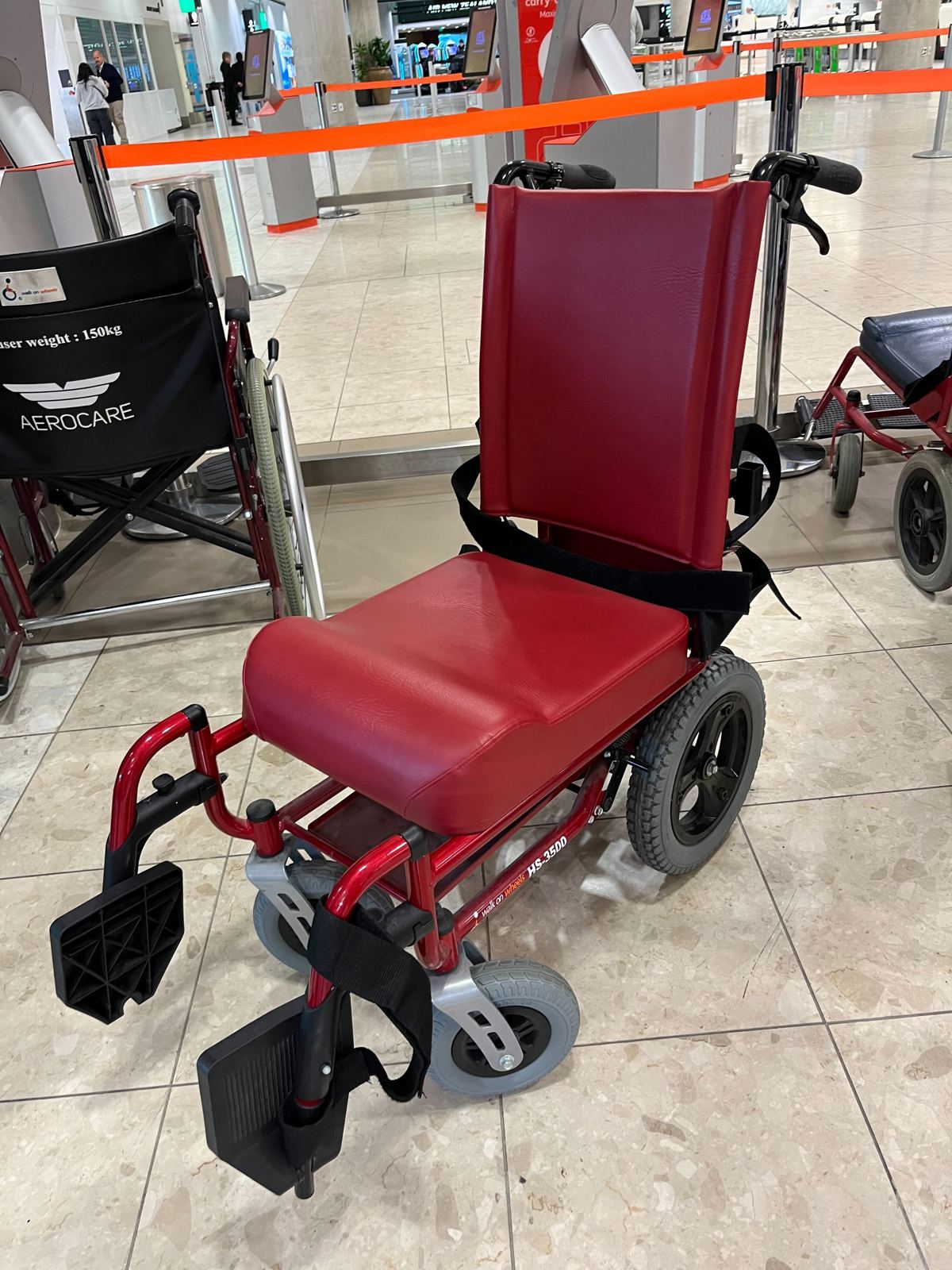 Red airport wheelchair 