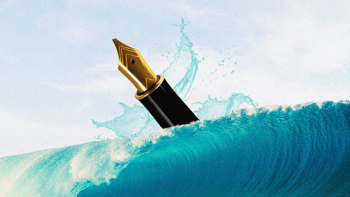 A fountain pen rises up from a big wave in the ocean.